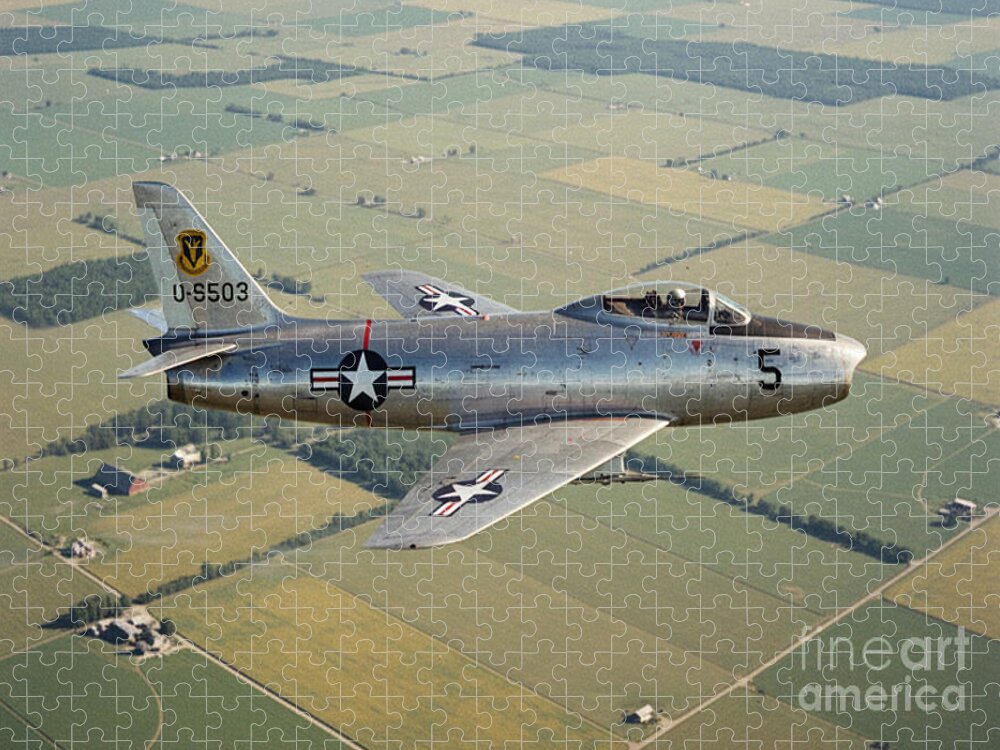 F-86 Sabre Flying Over Farmland Jigsaw Puzzle