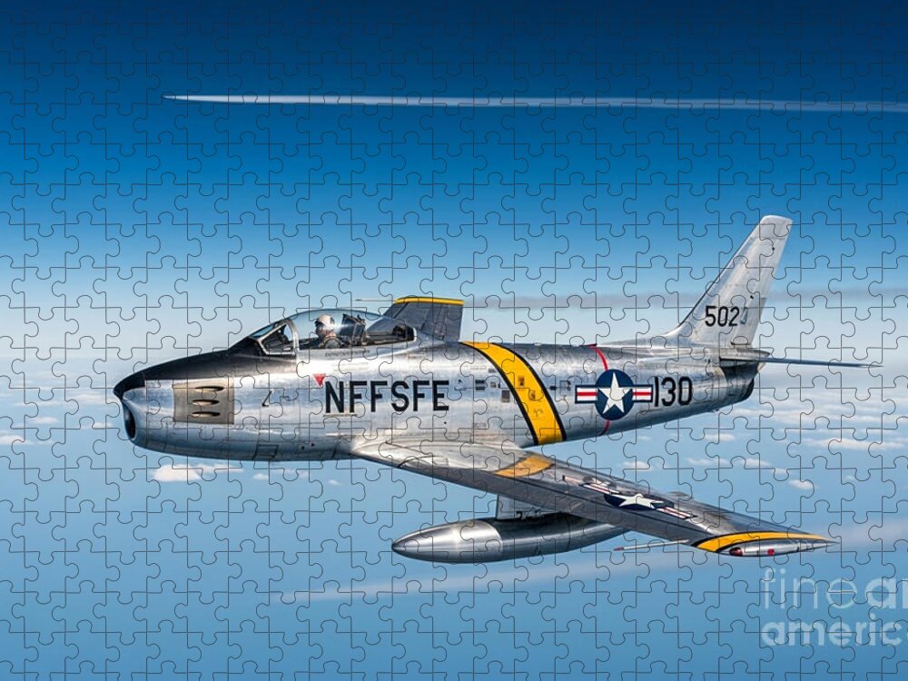 Vintage Jet Jigsaw Puzzle Flying Over Cloudy Skies